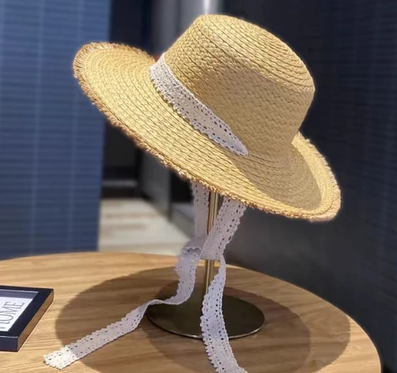 Chapeau de soleil en paille tissé pour les vacances d'été