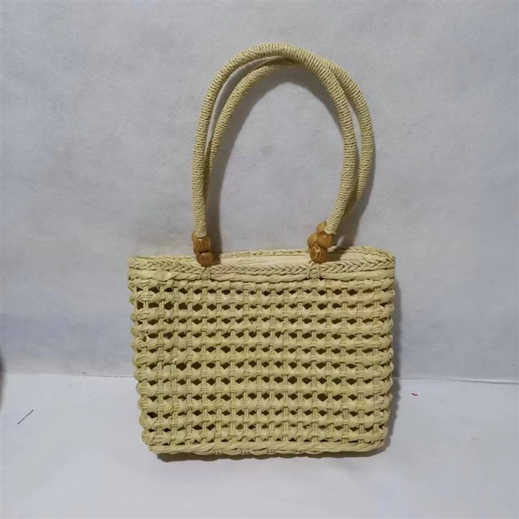 Sac pour femme en paille creuse beige fait main