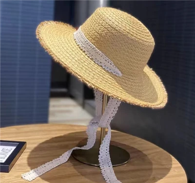 Chapeau de soleil en paille tissé pour les vacances d'été