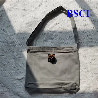 Sac à bandoulière sur toile avec fermeture éclair